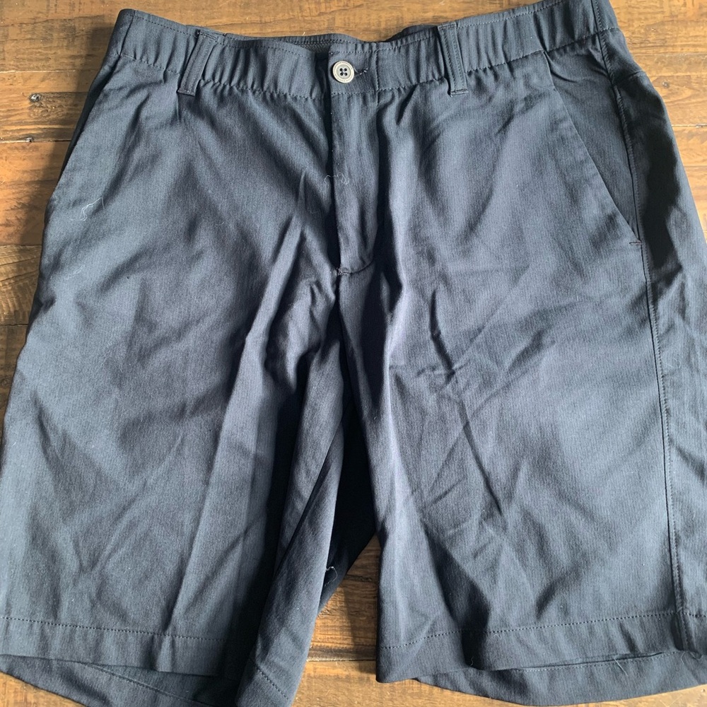 Black Under Armour Golf Shorts. Size: 34.